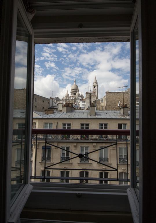 Hotel Montmartre Париж Стая снимка